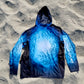 Angler 24-7 fishing shirt on beach.